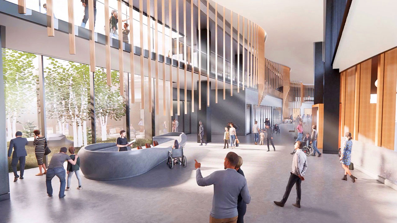 The concourse inside the main entrance of the new hospital, with plenty of natural light and view of an outdoor light well embedded at the centre of the building. (Artist rendering, subject to change)